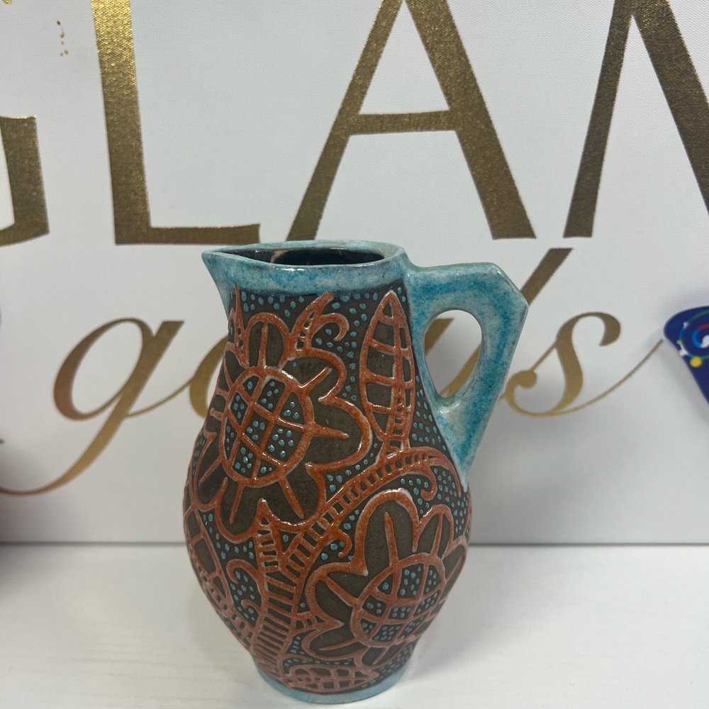 Blue and Brown Decorative pottery Sculpture with Intricate Patterns